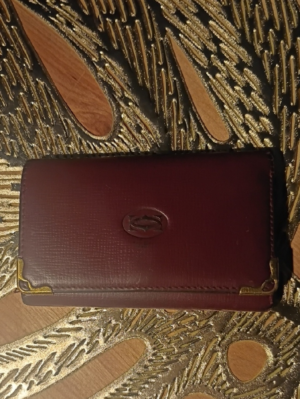 Cartier Burgundy Leather Keyholder with Gold Corner Accents